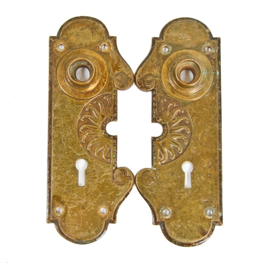 two matching unusually designed early 20th century antique american ornamental cast brass passage door escutcheons