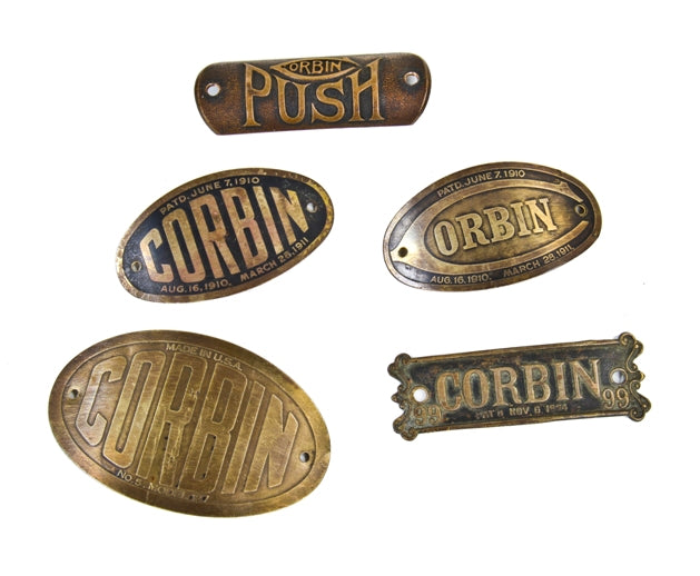 group of early antique american stamped yellow brass interior door check valve casing name plaques