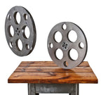 matching set of oversized vintage industrial aluminum self-threading film reels with perforated side plates