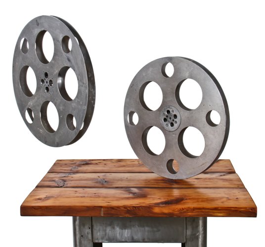 matching set of oversized vintage industrial aluminum self-threading film reels with perforated side plates