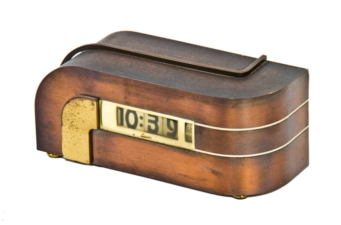 all original and functional c. 1930's american art deco machine age "zephyr" electric desk or table clock