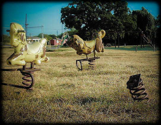 late 1960's freestanding cast aluminum city park chicken "saddle mate" complete with handlebars and stationary footrest
