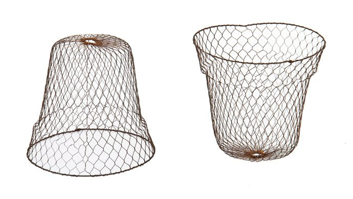 two matching c. 1920's vintage american industrial weathered and worn "expandable" steel wire mesh planter pot liners