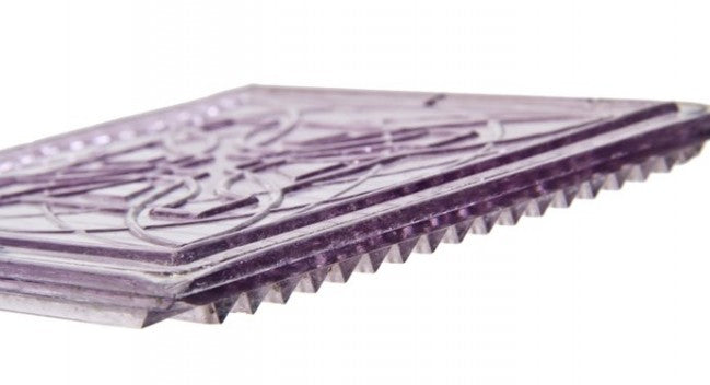 two original early 20th century american frank lloyd wright-designed "sun-purple" ornamented luxfer prism tiles