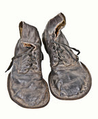 pair of unusual american c. 1930's worn and weathered ringling brothers circus high top wingtip clown shoes with original laces