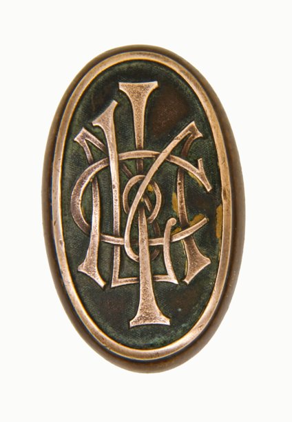 c. 1920's original american ornamental cast bronze mutual life insurance building oval-shaped monogrammed doorknob