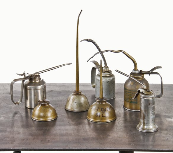 nice assortment of old industrial tin and polished steel "eagle brand" machine shop oil cans with long spouts