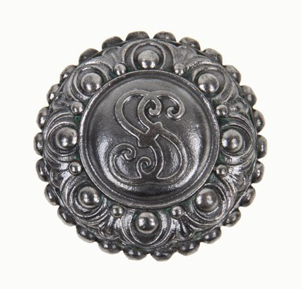 highly stylized late 19th century ornamental cast iron monogrammed commercial building office doorknob