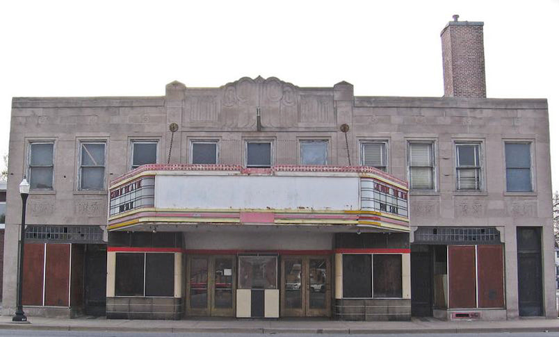 original c. 1930 american art deco style calumet theater exterior building facade limestone panel featuring highly stylized floral motifs