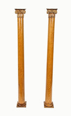 matching set of late 19th century lightly varnished quartered oak wood interior residential columns with pressed gesso ornamented capitals