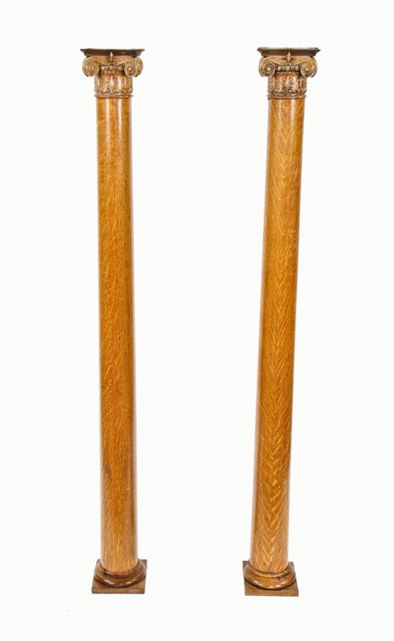 matching set of late 19th century lightly varnished quartered oak wood interior residential columns with pressed gesso ornamented capitals