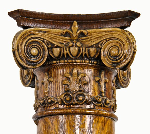 matching set of late 19th century lightly varnished quartered oak wood interior residential columns with pressed gesso ornamented capitals