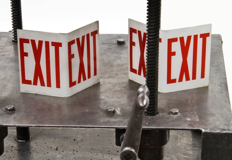 matching set of c. 1950's bent plate glass exit light panels with double-sided bold red enameled lettering