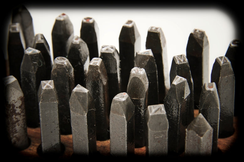 complete set of early 20th century american vintage industrial solid steel machine cut hand letter stamps with original wood block
