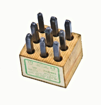 original vintage american industrial "gruv-grip" solid steel hand number stamps with pine wood black base