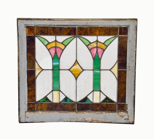 original and largely intact early 20th century american arts & crafts stained glass residential window with two symmetrically arranged abstract floral motifs