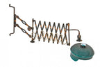 rare and seldom found early 20th century antique american medical oxidized copper expandable scissor arm optician's examination wall light with distinctive cased green glass shade