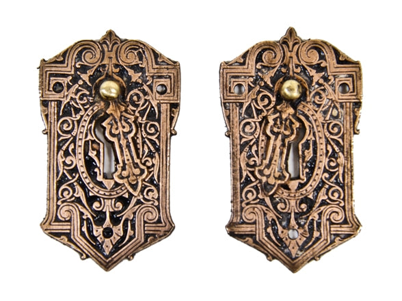 two matching intricately designed real bronze metal american victorian era key escutcheons with swinging keyhole covers