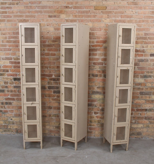 three matching original american industrial six-unit enameled steel factory locker units with ventilated hinged doors