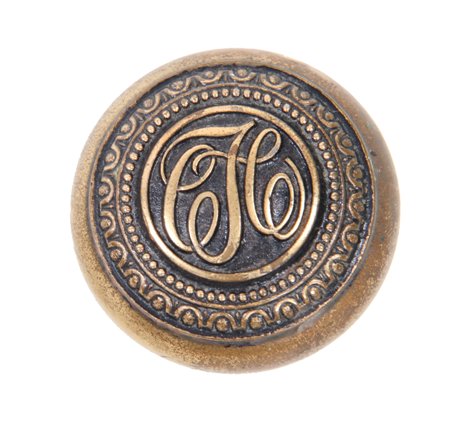 late 19th century american chicago office building monogrammed cast brass doorknob with black enameled inlay