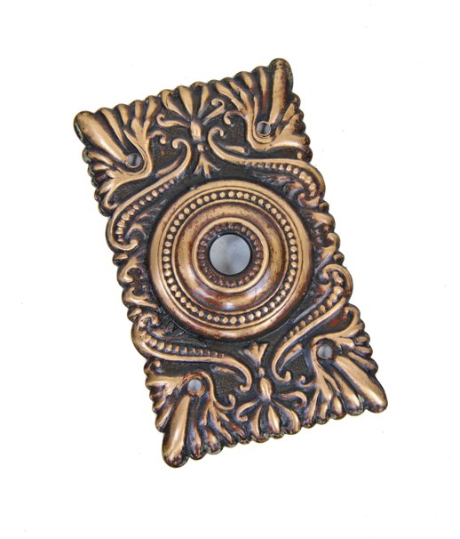 early 20th century american victorian era ornamental stamped brass exterior residential push button doorbell backplate