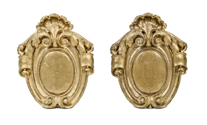 set of original and largely intact c. 1920's neoclassical style gold enameled lawndale theater cast plaster cartouches with foliated scrollwork