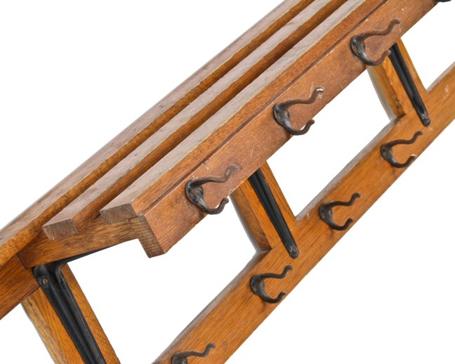 early 20th century american wall-mount interior train depot luggage room solid oak wood garment rack with cast iron double hooks