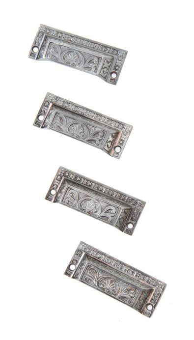 four matching 19th century antique american ornamental cast iron druggists apothecary cabinet drawer or bin pulls