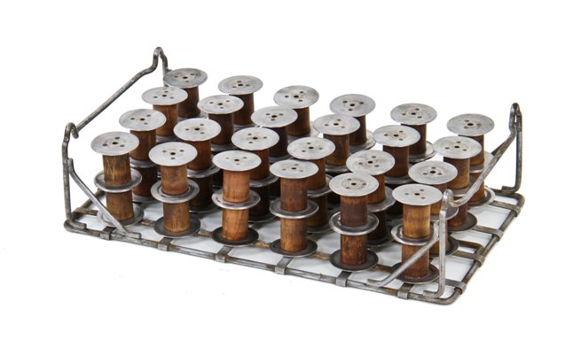 complete set of vintage american industrial stackable steel flange spools with custom built reinforced metal rack