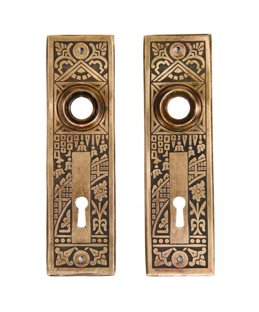 matching pair of original late 19th century american eastlake style "ceylon" pattern brass doorknob backplates