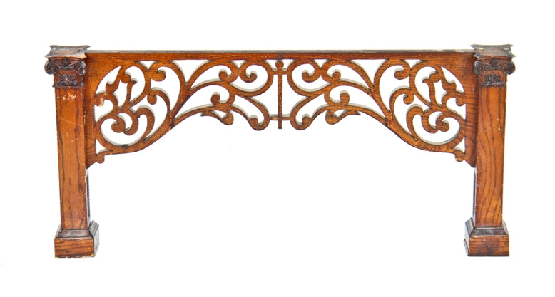 late 19th century original and largely intact built-in cabinet varnished oak fretwork panel with opposing pilasters