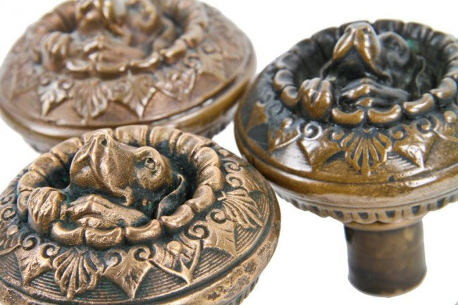 sought after original late 1860's ornamental cast bronze figural ludwig kreuzinger-designed  "doggie" doorknob with nicely aged patina