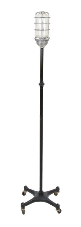 rewired vintage american industrial mobile theater stage upright "ghost light" with four-legged cast iron base