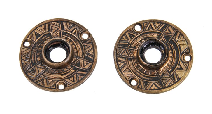 matching set of unusual strongly geometric 19th century antique american cast bronze doorknob rosettes