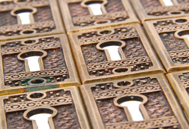 twelve matching antique american c. 1880's "brocade" pattern ornamental cast bronze interior residential keyhole escutcheons