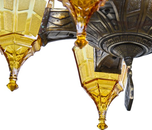 c. 1930's american depression era fully functional art deco style five-light slip shade interior residential ceiling fixture with uniquely shaped pressed amber glass shades