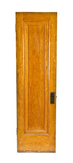 original c. 1920's american interior residential golden oak wood closet door with brass-plated ball finial hinges