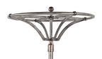 hard to find and highly desirable early 20th century vintage industrial brushed metal revolving garment rack with weighted cast iron base