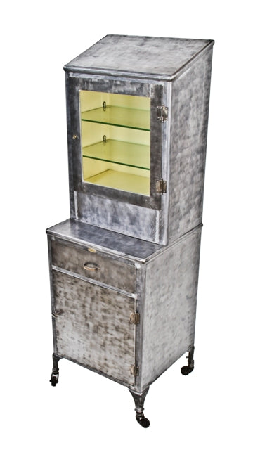 original and completely intact early 20th century indianapolis "state lunatic asylum" heavy gauge steel sectionalized hospital supply cabinet