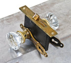 functional c. 1930's american interior residential chicago bungalow passage door lockset with "crystal" glass doorknobs
