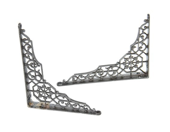 matching set of intricately designed late 19th century refinished ornamental cast iron wall-mount shelf support brackets