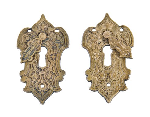 two matching highly stylized 19th century ornamental cast bronze oversized door escutcheons with swinging keyhole covers