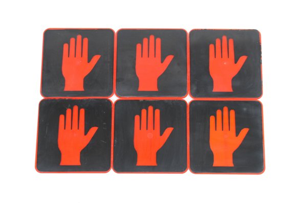 matching lot six single-sided molded plastic city street pictogram traffic signal lenses depicting the "don't walk" hand signal