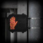 intact single-sided chicago city street cautionary halting hand pedestrian crosswalk signal lens with baked black enameled finish