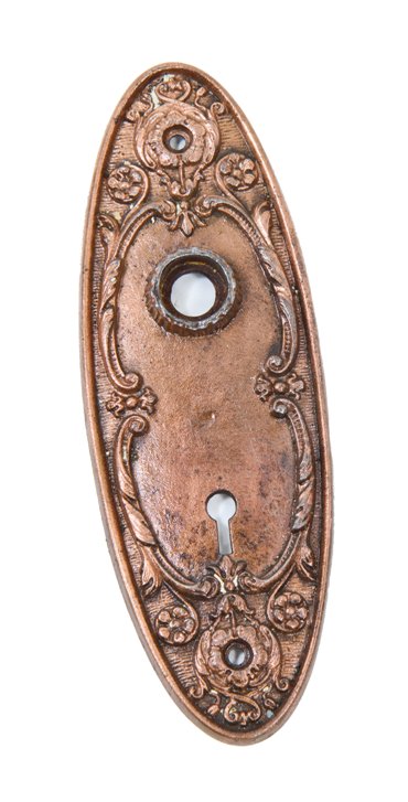 original c. 1900's oval-shaped ornamental copper-plated cast iron interior residential doorknob backplate