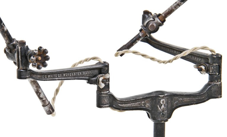 highly desirable early 20th century american industrial black enameled cast iron double arm "white portable" work bench articulating task lamp