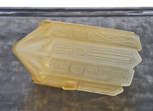 highly collectible c. 1930's american art deco style mcfadden patent pressed ornamental amber glass slip shade