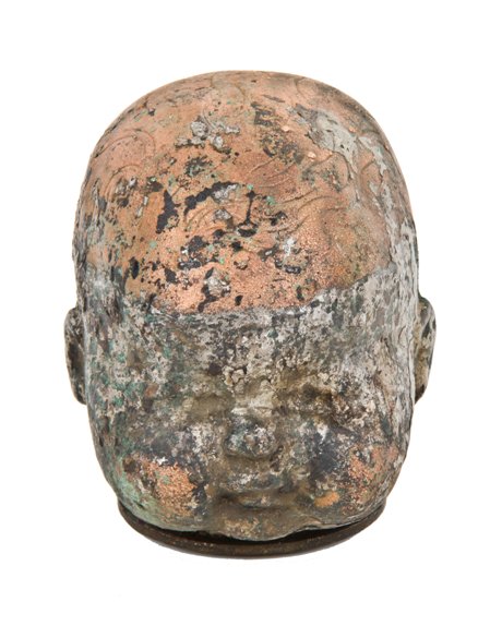 unique vintage american industrial mid-20th century oversized hallow copper metal doll head mold with vinyl residue left intact