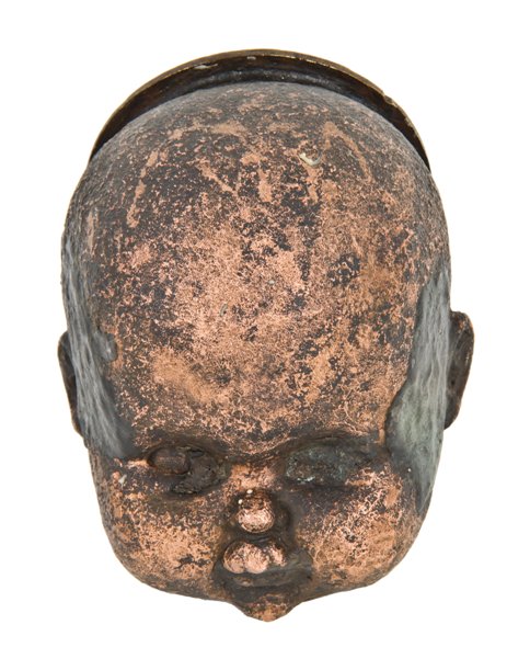 mid-20th century american vintage industrial hallow copper factory baby doll head production mold with nicely aged patina