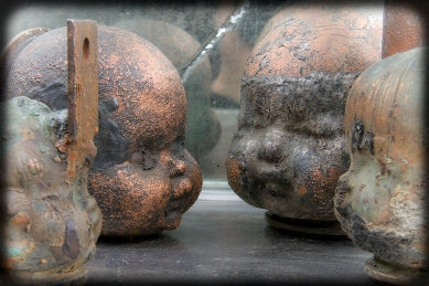 mid-20th century american vintage industrial hallow copper factory baby doll head production mold with nicely aged patina
